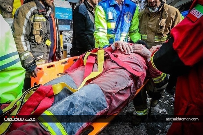 آتش‌نشانان مصدوم حادثه آتش‌سوزی و ریزش ساختمان تجاری پلاسکو